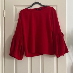 Red bell sleeve top